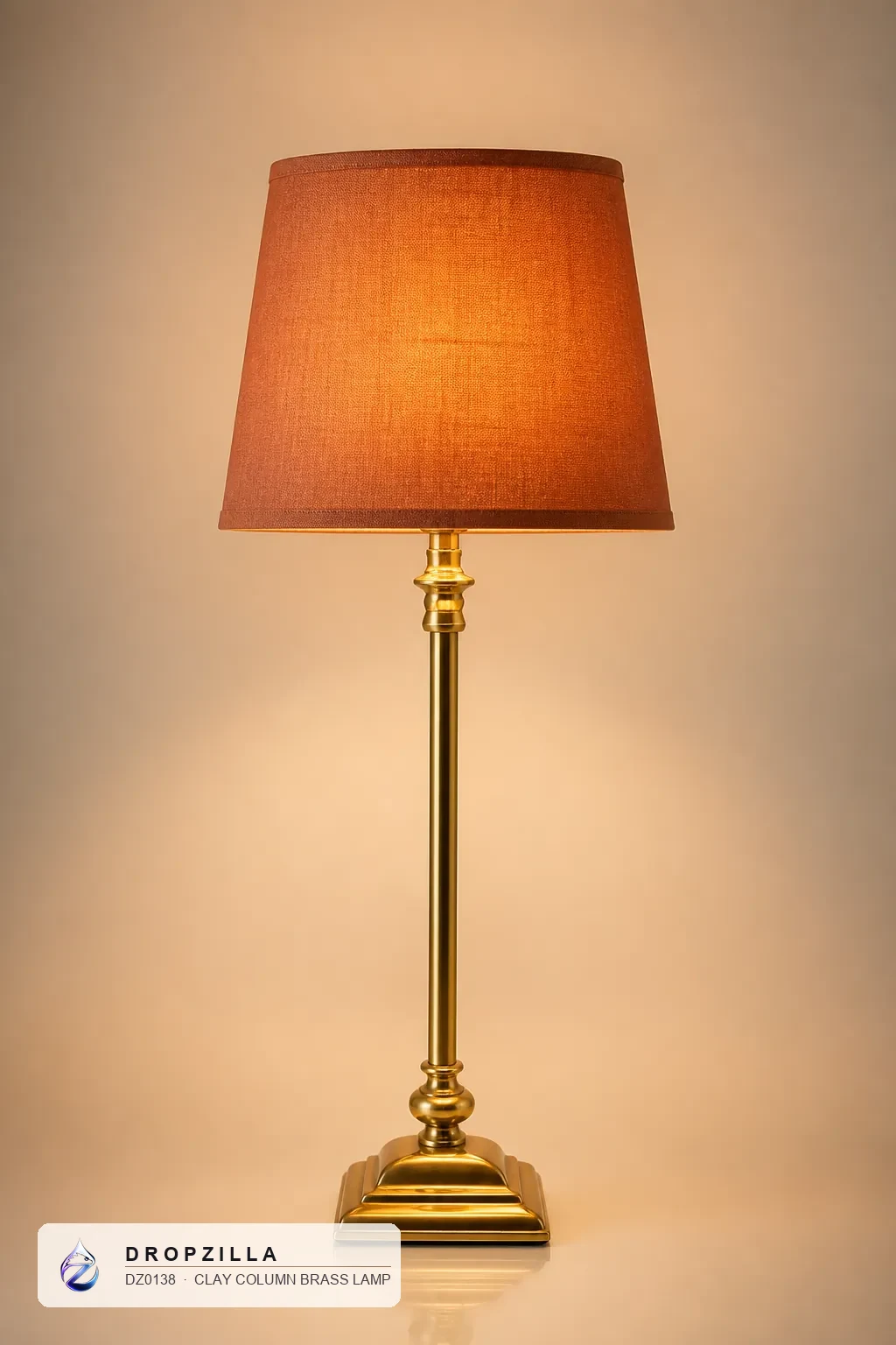 Clay Column Brass Lamp — Table & Floor Lamps — Brass & aluminium with a golden finish, plus a fabric drum shade — Dropzilla